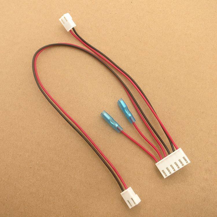 What is the advantage of using 42V voltage for automotive wiring harness?
