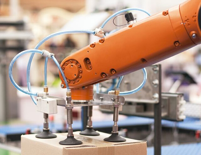 How to integrate industrial robots with CNC machine tools?